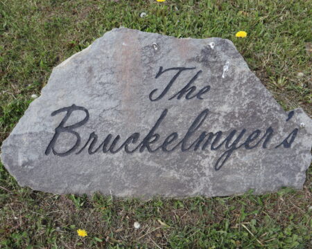 Engraved flagstone driveway sign with dark letters