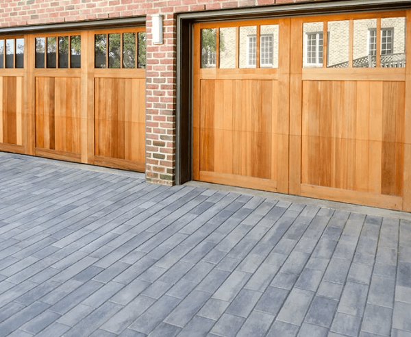 garage with grey pavers